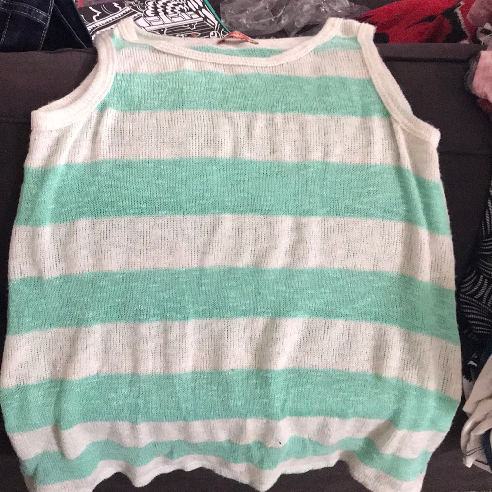 A teal and white knitted tank top.